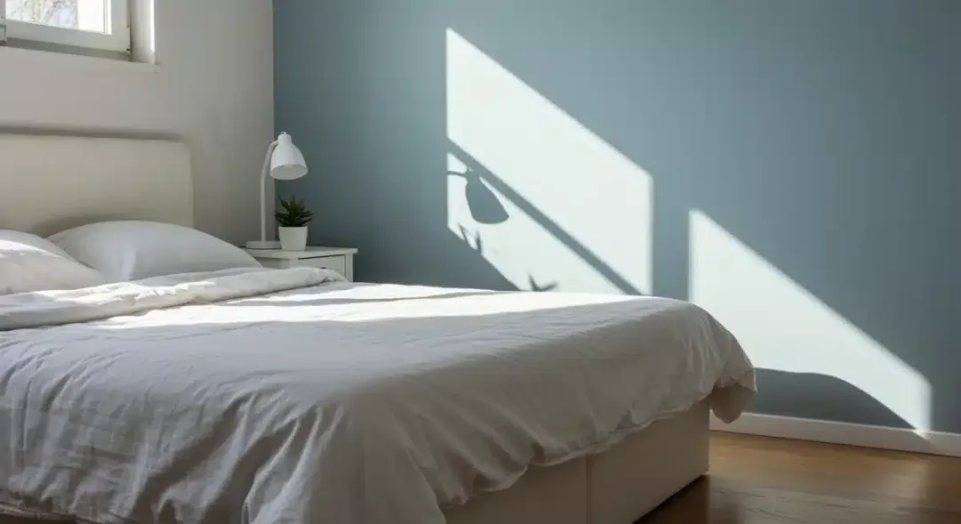 Serene and decluttered bedroom with minimalist design.