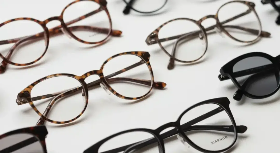 Assortment of modern eyeglass frames in various shapes and colors