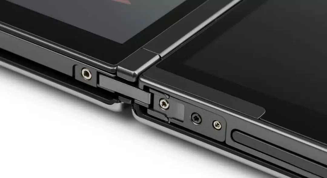Close-up of a foldable tablet's advanced hinge mechanism, emphasizing durability.